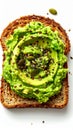 Mashed Avocado Toast with Seeds on White Background Royalty Free Stock Photo