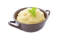 Mashed potato in brown ceramic bowl