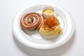 Mashed potato and roasted sausage or bratwurst on white plate Royalty Free Stock Photo