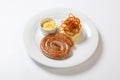 Mashed potato and roasted sausage or bratwurst on white plate Royalty Free Stock Photo