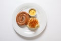 Mashed potato and roasted sausage or bratwurst on white plate Royalty Free Stock Photo