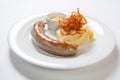 Mashed potato and roasted sausage or bratwurst on white plate Royalty Free Stock Photo