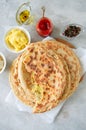 Mashed potato and sheep cheese filling flatbread on a white stone background. Royalty Free Stock Photo