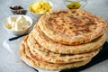 Mashed potato and sheep cheese filling flatbread on a white stone background. Royalty Free Stock Photo