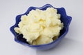 Mashed potatoes in blue bowl