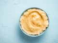 Mashed potatoes on blue concrete background Royalty Free Stock Photo