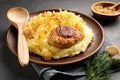 Mashed potatoes, boiled puree with fried onions and cutlet