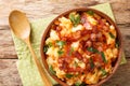 Mashed potatoes and carrots with bacon close-up in a bowl. horizontal top view Royalty Free Stock Photo