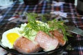 Mashed potatoes with fried sausage and fried egg in a plate Royalty Free Stock Photo