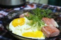 Mashed potatoes with fried sausage and fried egg in a plate Royalty Free Stock Photo