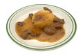 Mashed potatoes with gravy and beef tips TV dinner Royalty Free Stock Photo