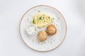 Mashed potatoes and meat balls with white sauce isolated on white background Royalty Free Stock Photo