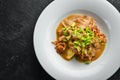 Mashed potatoes with veal sauce and meat on a plate. Royalty Free Stock Photo