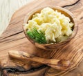 Mashed potatoes in the wooden bowl. Royalty Free Stock Photo