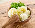Mashed potatoes in the wooden bowl. Royalty Free Stock Photo