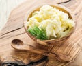 Mashed potatoes in the wooden bowl. Royalty Free Stock Photo