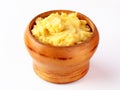 Mashed potatoes in wooden bowl on table with spices Royalty Free Stock Photo