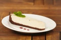 Cheescake on white plate served on table Royalty Free Stock Photo