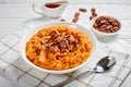 Mashed sweet potato topped with pecan nuts Royalty Free Stock Photo