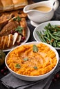 Mashed sweet potatoes on Thanksgiving table Royalty Free Stock Photo