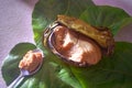 Mashed taro corms in coconut shell (binagol or binangol)