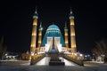 Mashkhur Jusup Mosque in the center of Pavlodar on a blue sky background in winter at night Royalty Free Stock Photo