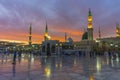 Masjid nabwi minerats and green dome in a dusky evening Madina, saudi arabia.