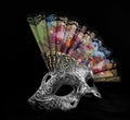 Carnival mask with folding fan. Royalty Free Stock Photo