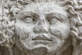 Mask of medusa in stone