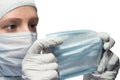 Mask for respiratory protection, in the hands of a laboratory employee