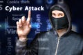 Masked anonymous hacker is pointing on Cyber attack