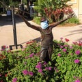 Masked Statue of A Boy with an Airplane During the Pandemic in 2020