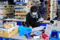 Masked assistent in a hardware store