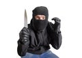 Masked criminal holding a knife Royalty Free Stock Photo