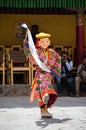 A masked dancer in traditional Ladakhi Costume performing during the annual Hemis festival Royalty Free Stock Photo