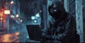 Masked data thief hacking computer network at night, working on laptop and multiple monitors to steal IT information