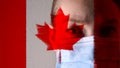 Masked man on the background of the flag of Canada. The epidemic, the dangerous virus of the crown of 2020. Infection and mass
