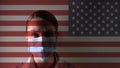 Masked man on the background of the USA flag. Epidemic, dangerous crown virus of 2020. Infection and mass diseases
