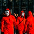 Masked member of Anonymous in Puerta del Sol, Madrid, Spain