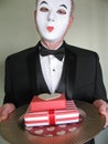 Elegant male mime delivers surprise Valentine gifts