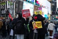 Protestors Holding Signs at Times Square in New York City during a Myanmar Protest against the Military Coup