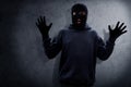 Masked thief arrested by police Royalty Free Stock Photo