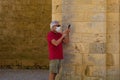 Masked Tourist at San Galgano Abbey