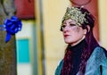 masked woman dressed as Medusa in a parade on the streets of ScorzÃâ in the province of Venice.