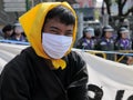 Masked Yellow-Shirt Protester
