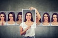 Masked young woman expressing different emotions Royalty Free Stock Photo