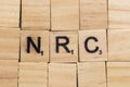 Maski, India- 18,may 2019 : NRC or National Register of Citizens in wooden block letters
