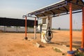 Maski,Karnataka,India - 10/23/2018 : Empty Indian oil Petrol Filling station in hot sunny day with sun at backdrop.