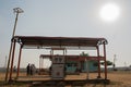 Maski,Karnataka,India - 10/23/2018 : Empty Indian oil Petrol Filling station in hot sunny day with sun at backdrop.