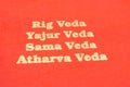 Maski,Karnataka,India - March 13,2019 :The Four types of Holy Vedas printed on red textured paper